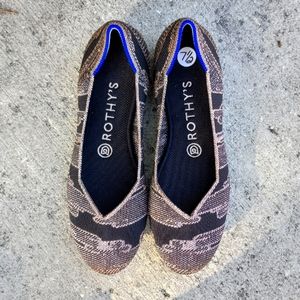 Rothy's rose gold and black shoes